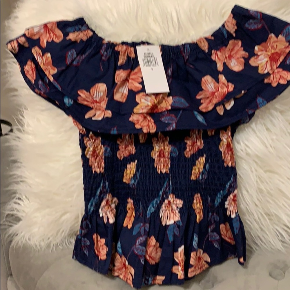 Off the shoulder floral top.